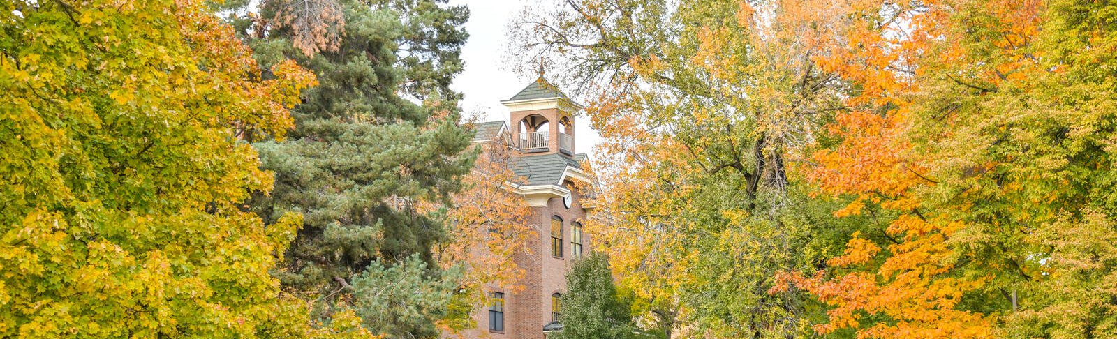 Building on Walla Walla University campus with trees.